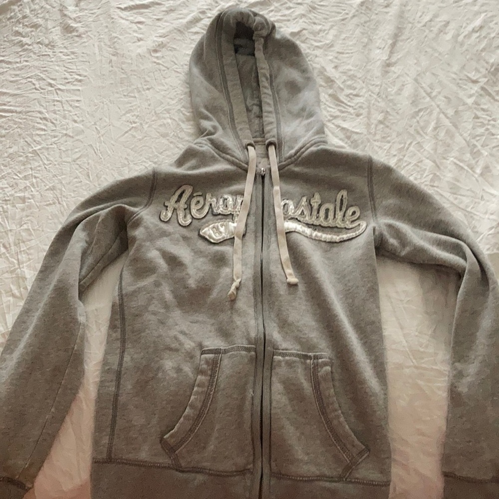 a zip up hoodie